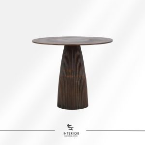 Round pedestal table with fluted sculptural base and dark bronze metal finish