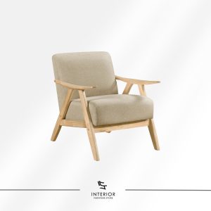 Upholstered lounge chair with a light wood frame, angled armrests, and thick cushioned seat and backrest in a soft neutral fabric.