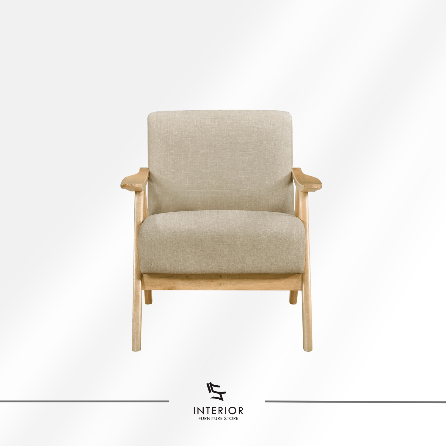 Upholstered lounge chair with a light wood frame, angled armrests, and thick cushioned seat and backrest in a soft neutral fabric.