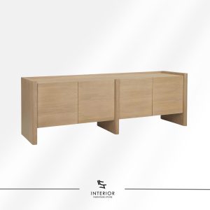 Light wood cabinet with a clean, block-like form, featuring flat panel doors, seamless surfaces, and solid vertical supports.