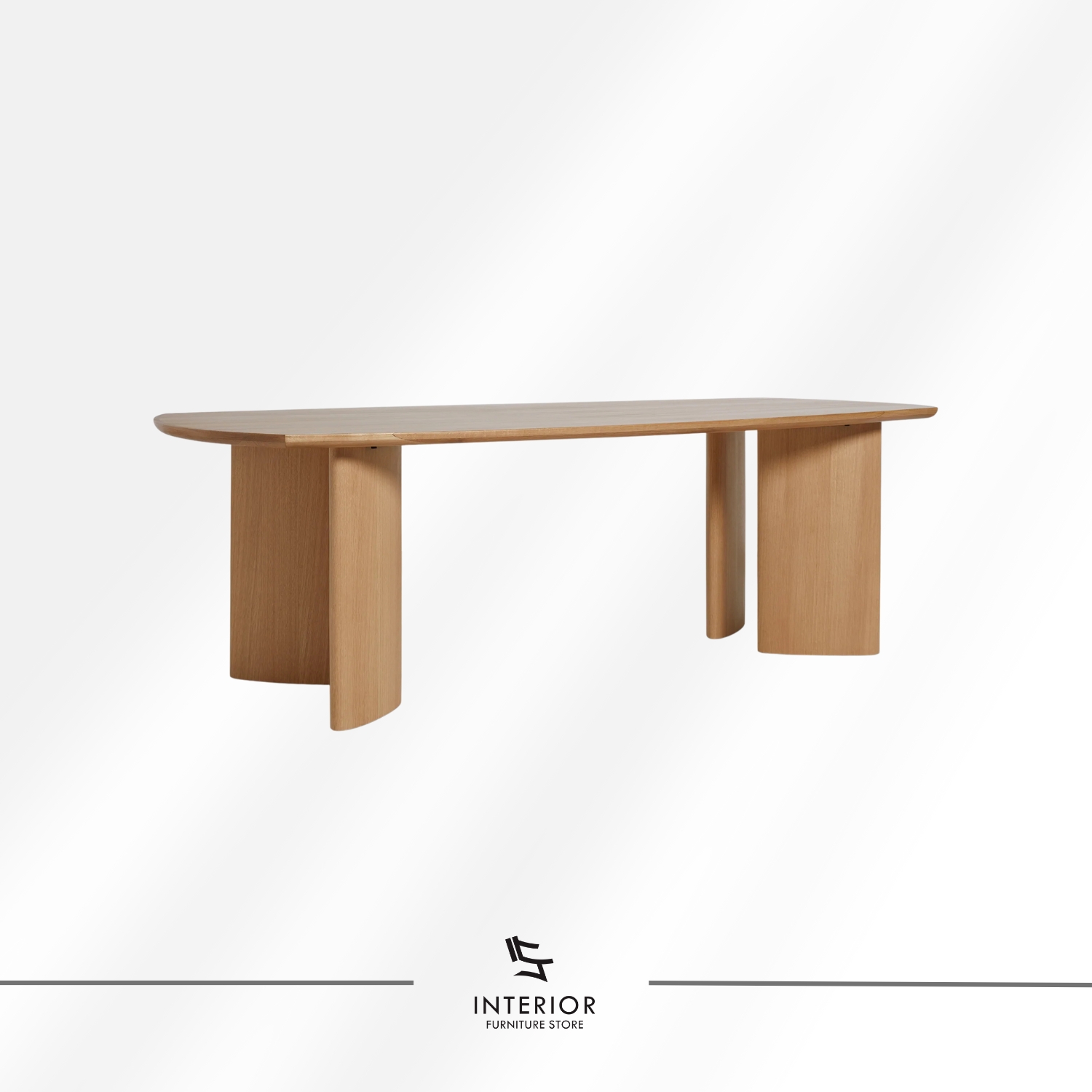 Modern solid wood dining table with elongated tabletop and sculptural wooden legs in natural finish