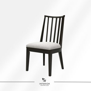 Dark wooden dining chair with a vertical slatted backrest and a light gray upholstered seat cushion. The sturdy frame and gently curved top rail add structure and subtle elegance.