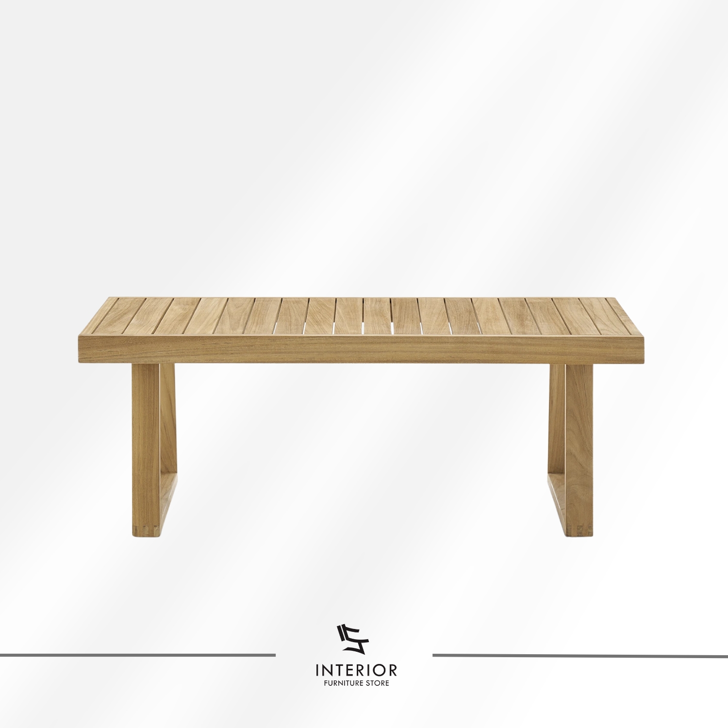 Rectangular wooden coffee table with a slatted top and angled frame legs in a natural finish.