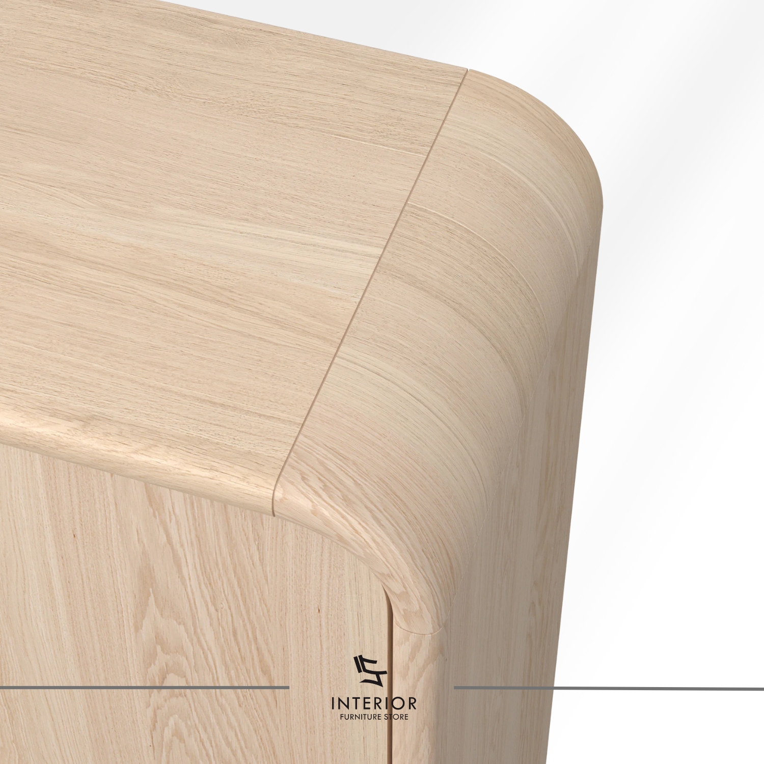 Rounded wooden wardrobe with softly curved edges, double doors, and a light natural wood finish.