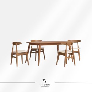 Wooden dining table set with a rectangular table and four matching chairs featuring curved backs and light upholstered seats.