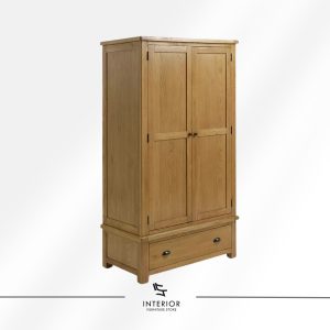 Solid wood wardrobe with a classic vertical form, featuring two paneled doors above a wide bottom drawer with rounded metal pulls.
