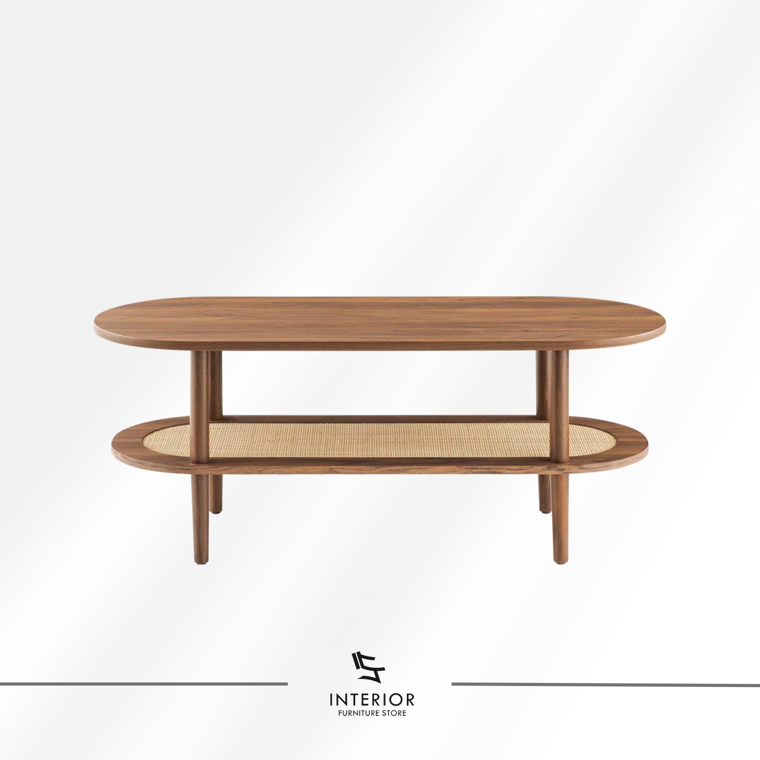 Oval wooden coffee table with a rounded top, cylindrical legs, and a lower shelf featuring woven rattan detail.