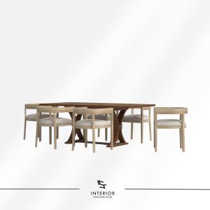 Two tone wooden dining table set with a rectangular tabletop, sculptural pedestal base, and six light wood chairs with upholstered seats.