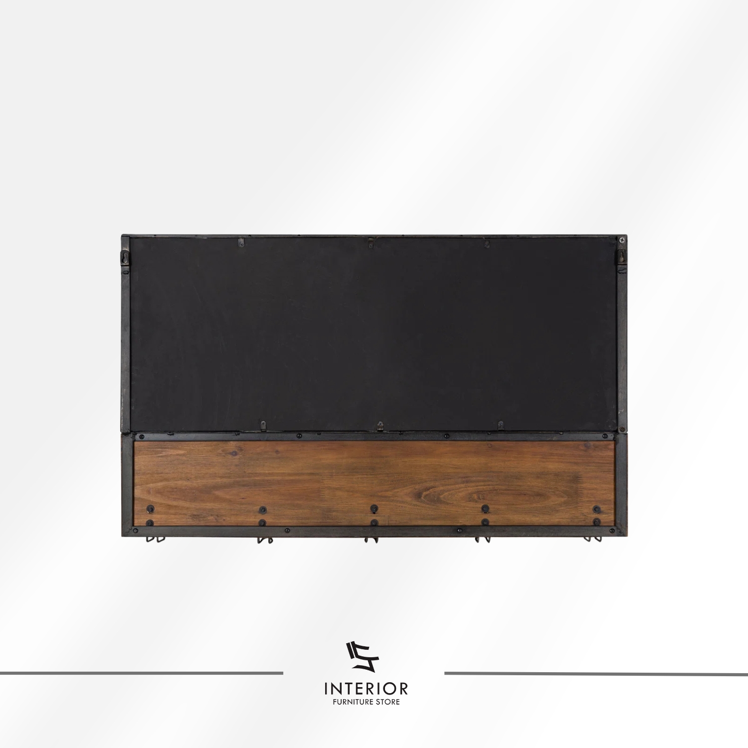 Wall-mounted entryway shelf with a rectangular mirror, warm wooden ledge, and multiple black metal hooks for hanging items.