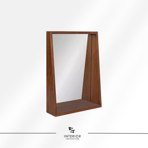 Rectangular wall mirror with a solid wood frame and deep built-in shelf on the right side. The angled inner panel adds a distinctive geometric touch.