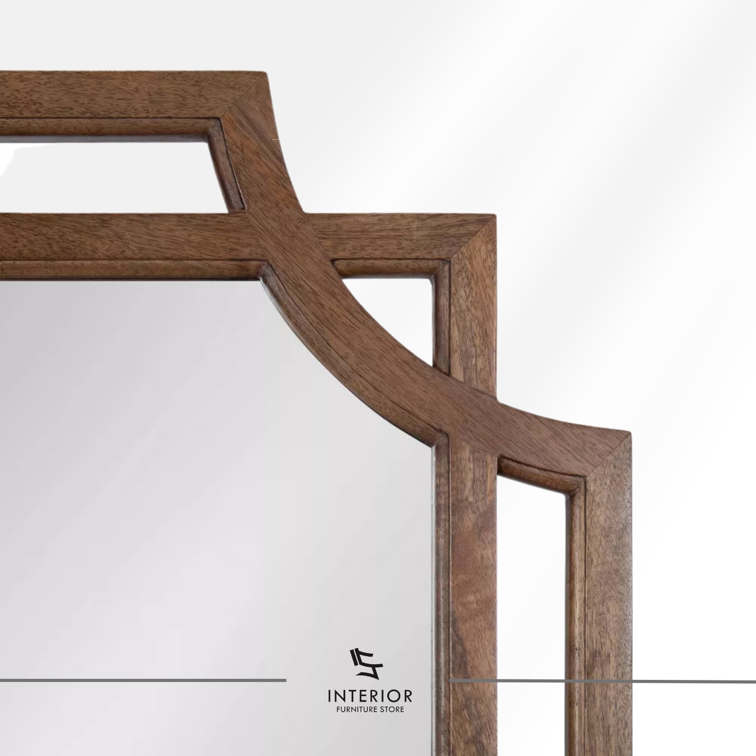 Decorative wall mirror with a geometric wooden frame featuring layered edges and open side accents.