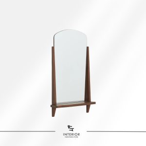 Wall mounted arched mirror framed with solid wood supports and a small wooden ledge at the bottom. The design combines clean lines with warm natural tones for a simple, functional accent.