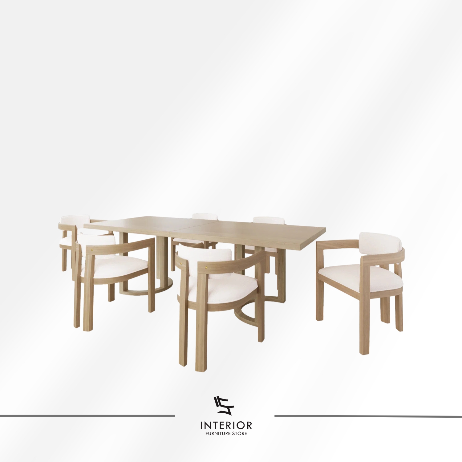 Light wood dining table set featuring six upholstered armchairs with curved backrests, soft neutral cushions, and a spacious rectangular tabletop designed for comfortable shared meals.