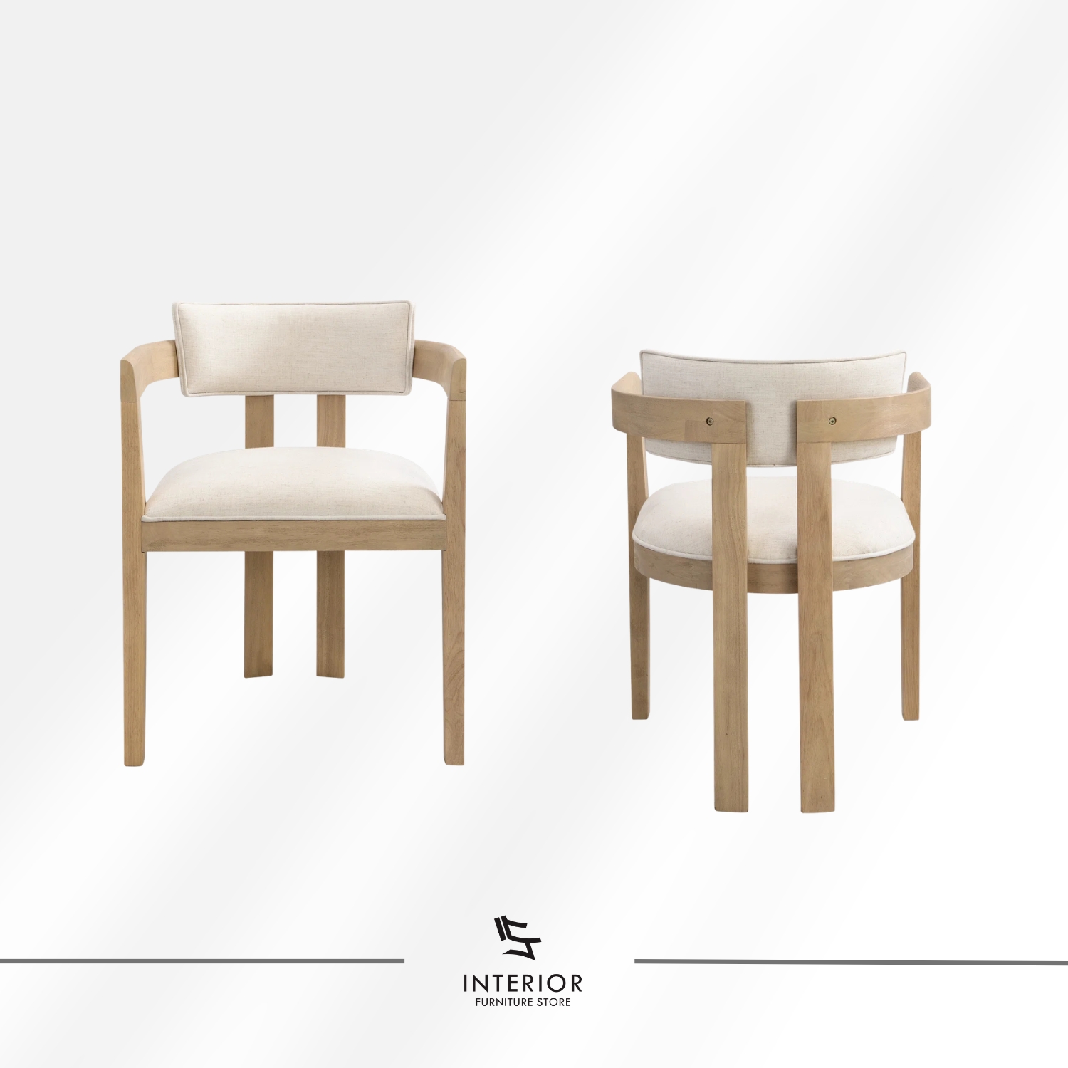 Light wood dining table set featuring six upholstered armchairs with curved backrests, soft neutral cushions, and a spacious rectangular tabletop designed for comfortable shared meals.