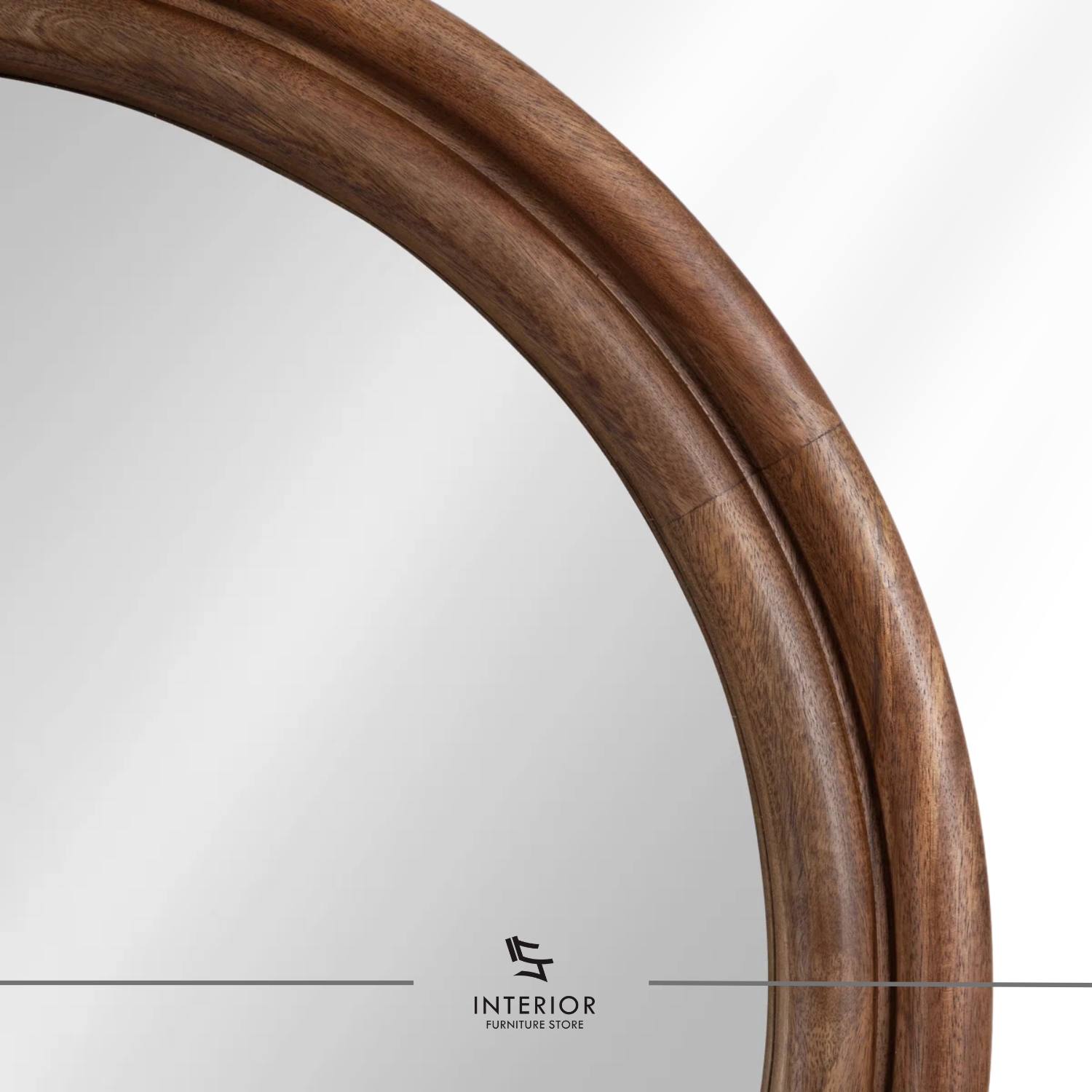 Round wall mirror with a thick, layered wooden frame in a warm natural finish.