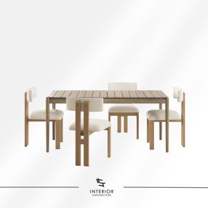 Rectangular wooden dining table with slatted top, paired with four minimalist chairs featuring light wood frames and upholstered cream seats and backrests.