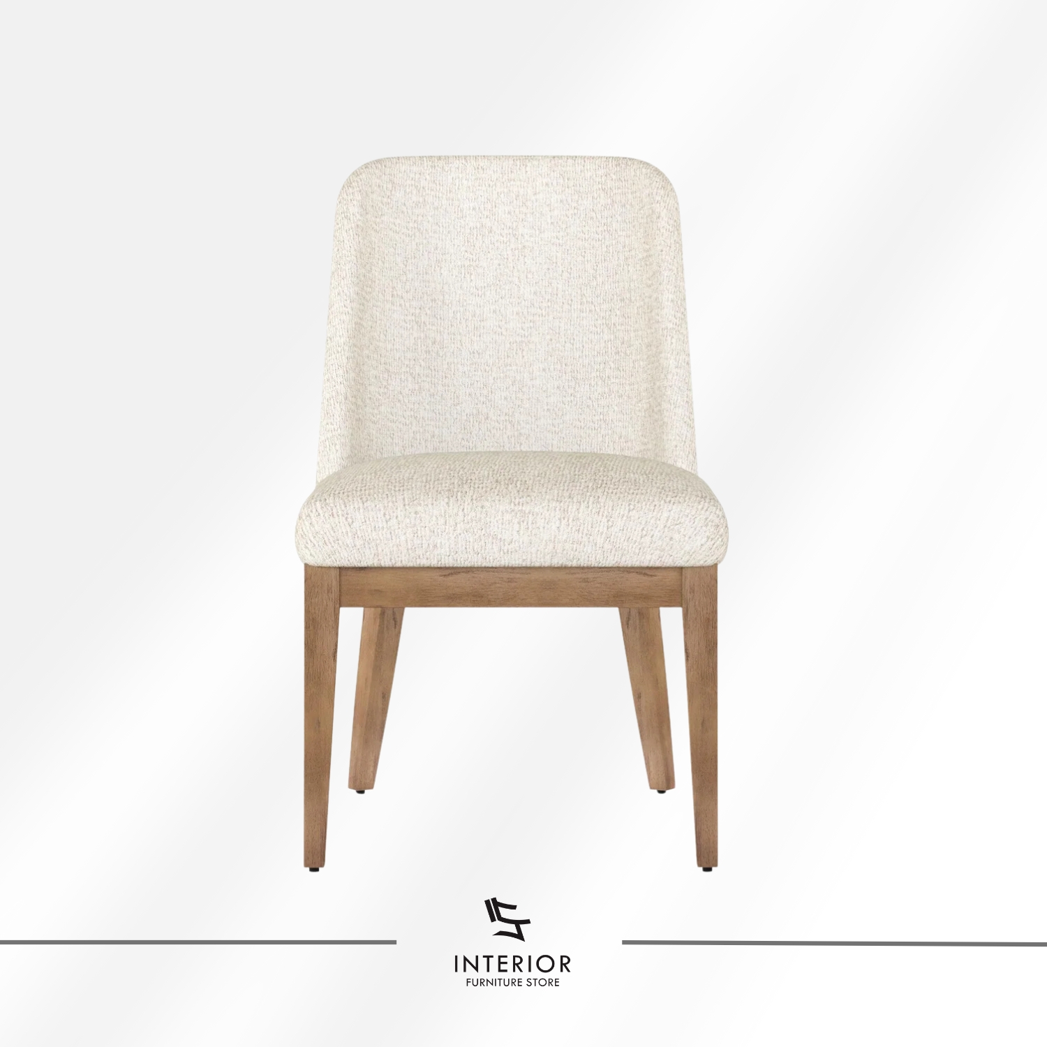 Upholstered dining chair with a softly curved backrest, padded seat, and natural wood legs.