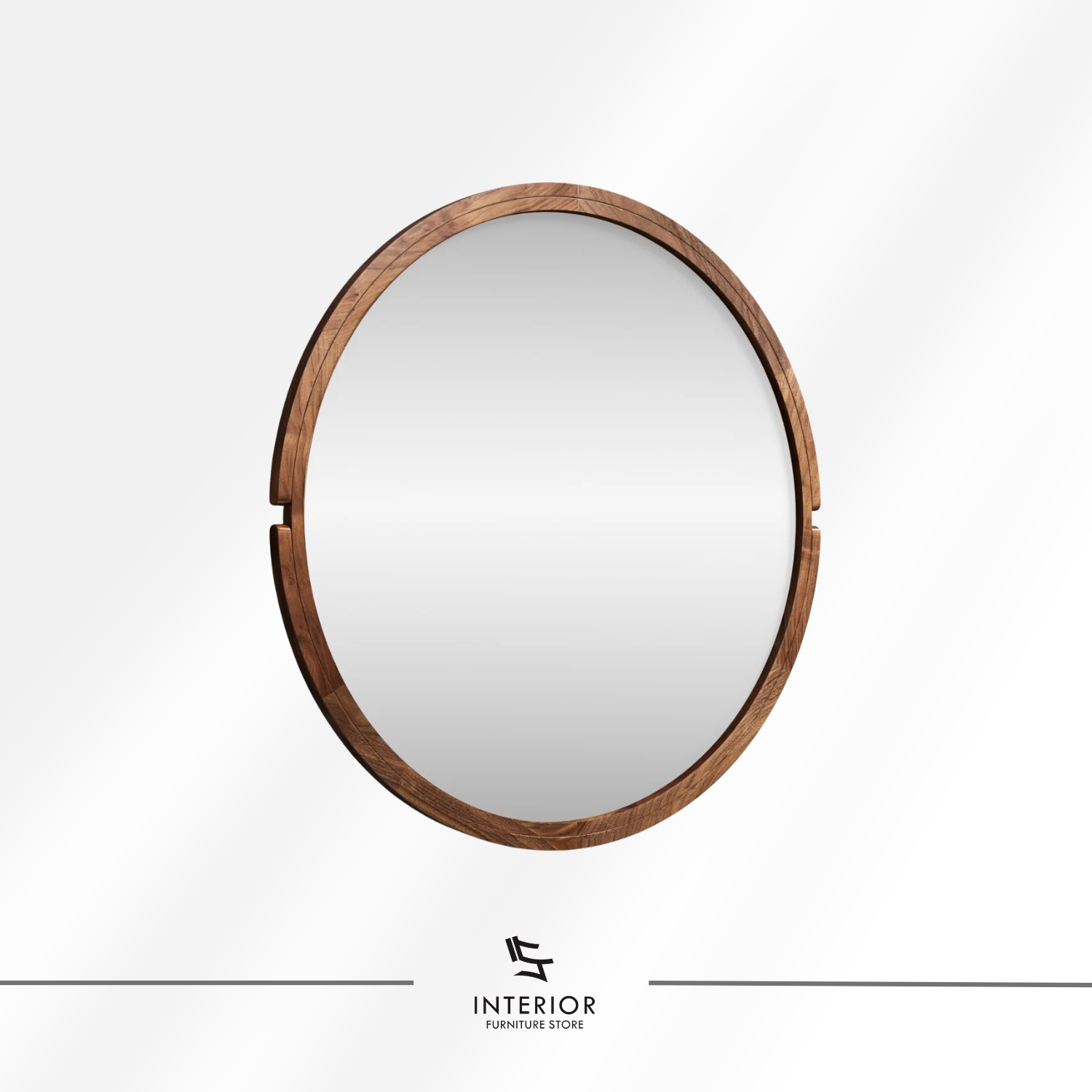 Round wall mirror with a solid wood frame and subtle carved side accents.