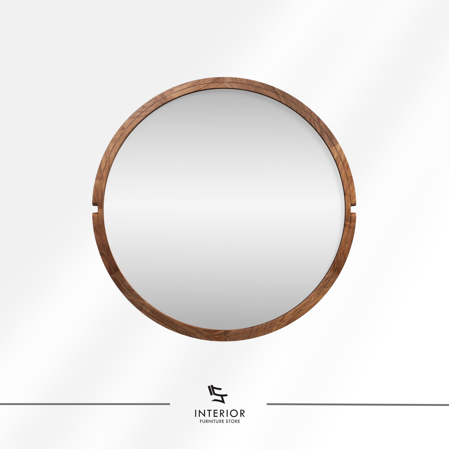 Round wall mirror with a solid wood frame and subtle carved side accents.
