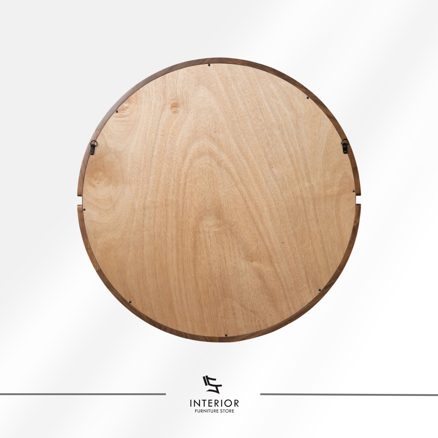 Round wall mirror with a solid wood frame and subtle carved side accents.