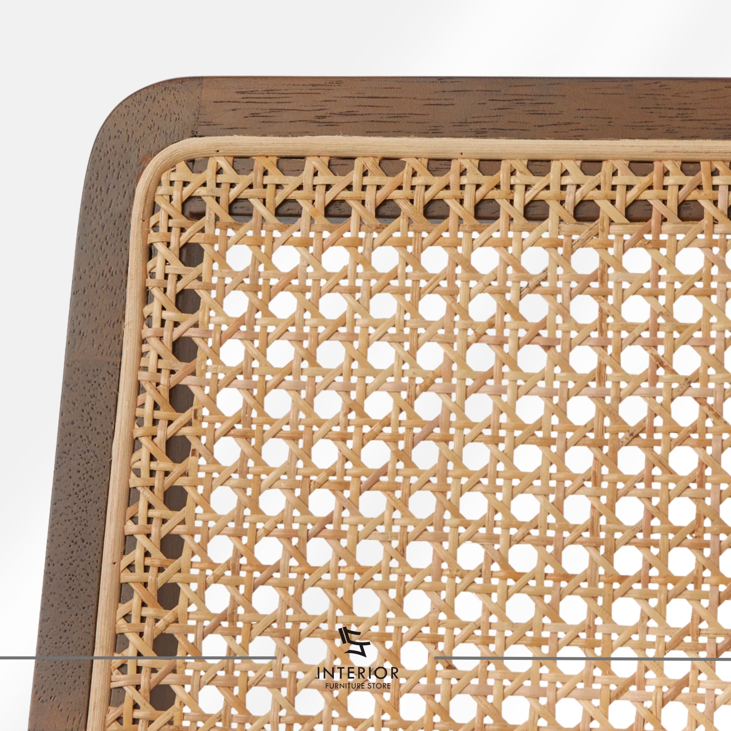 Solid wood dining table set with four chairs, featuring woven rattan backrests, soft upholstered seats, and a warm brown finish that enhances its clean, timeless appeal.