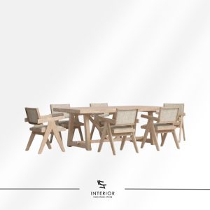 Light wood dining table set with six armchairs featuring woven backrests and seats.