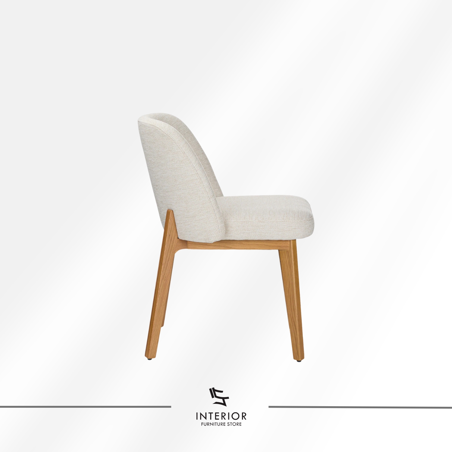 Upholstered dining chair with curved backrest and natural wooden legs.