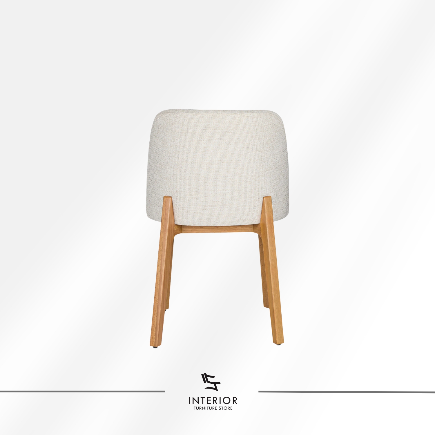 Upholstered dining chair with curved backrest and natural wooden legs.