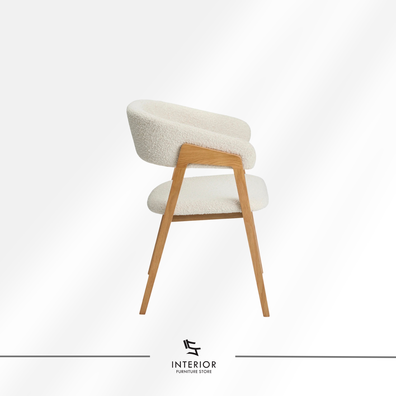 Upholstered dining chair with curved backrest and natural wooden legs.