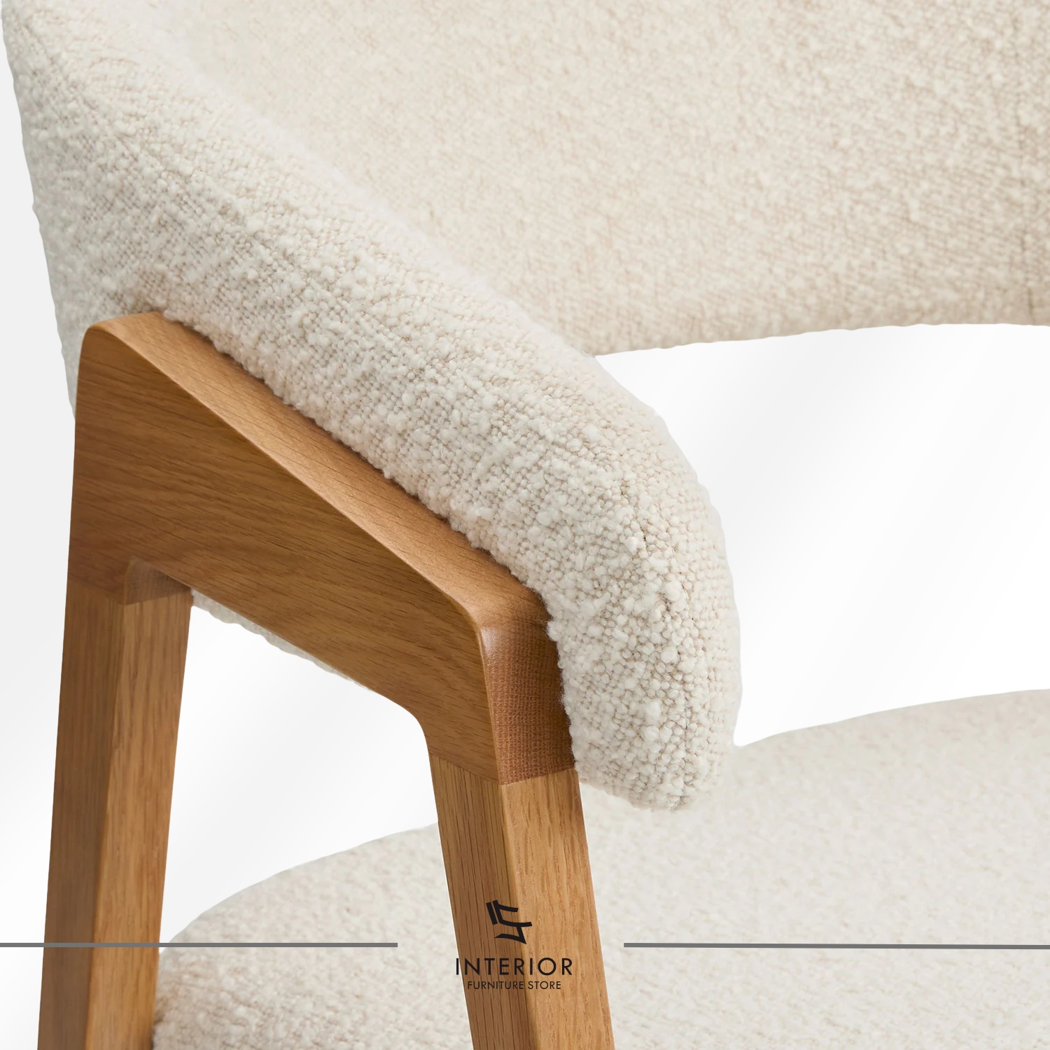 Upholstered dining chair with curved backrest and natural wooden legs.