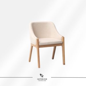 Dining chair with upholstered seat and backrest, supported by a solid wooden frame.