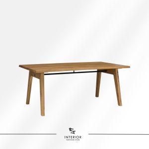 Rectangular wooden dining table with angled legs and a metal support bar.
