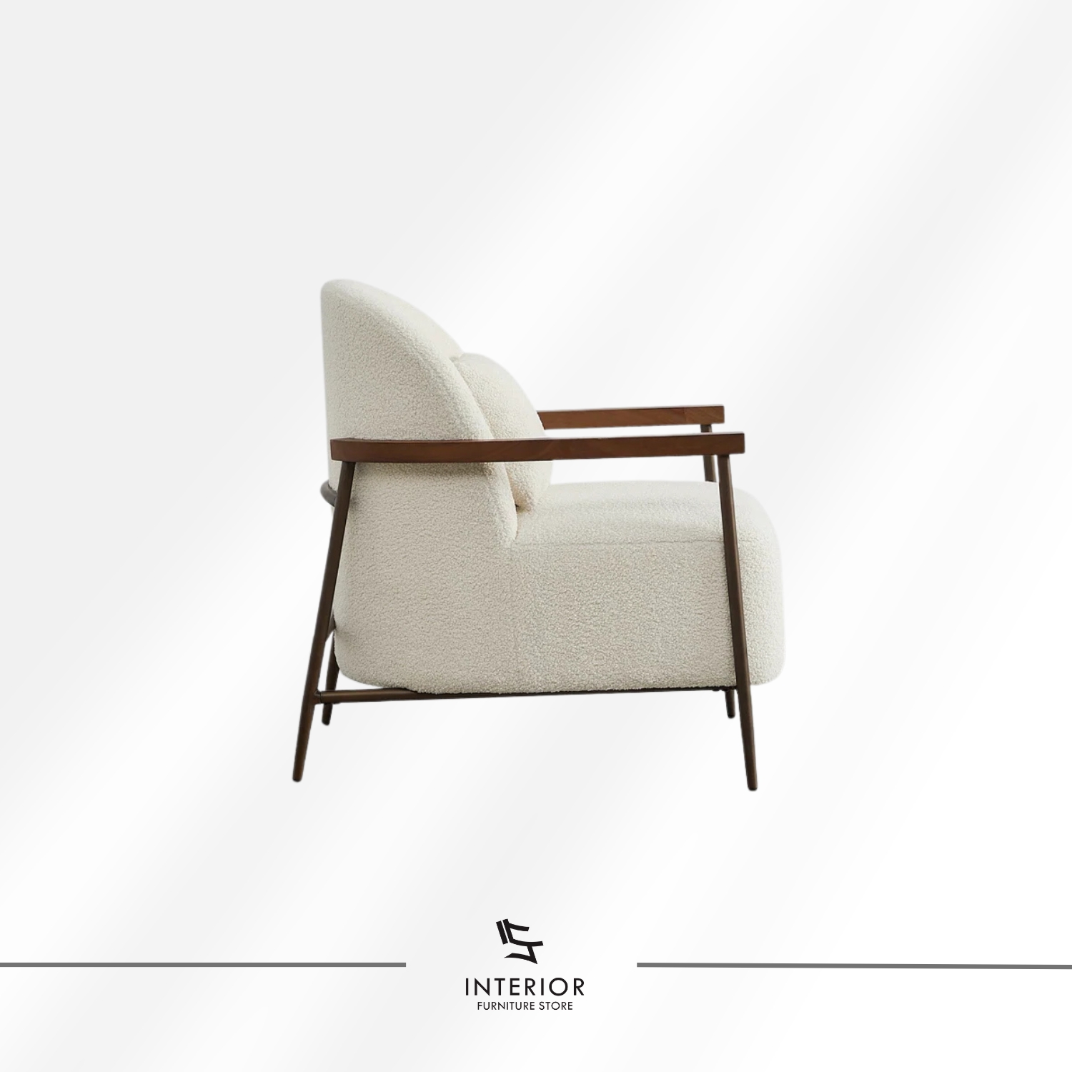 Modern armchair with textured cream upholstery, curved backrest, and solid wooden armrests and frame.