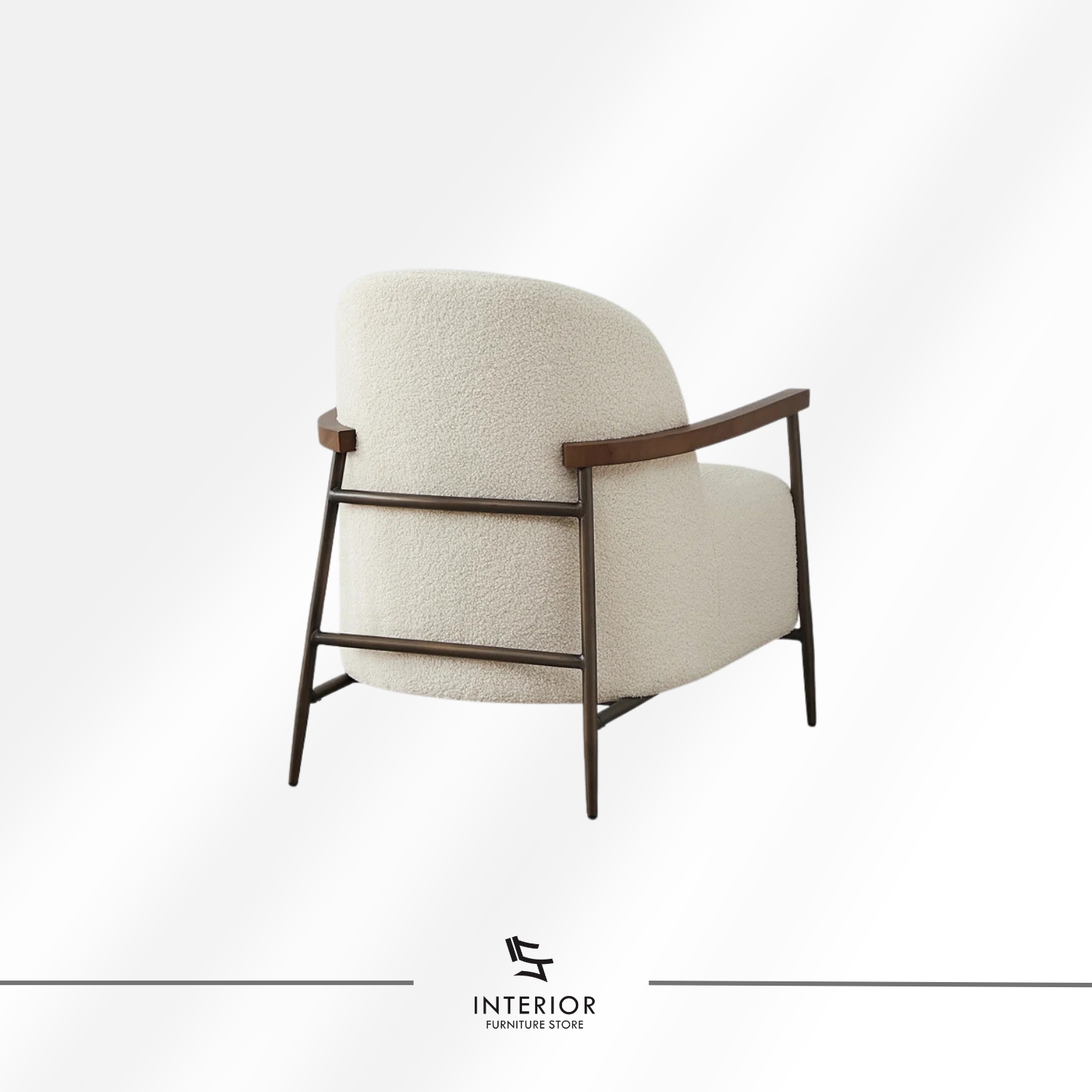 Modern armchair with textured cream upholstery, curved backrest, and solid wooden armrests and frame.