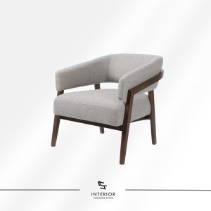 Armchair with curved upholstered backrest and seat, supported by a solid wooden frame with angled legs.