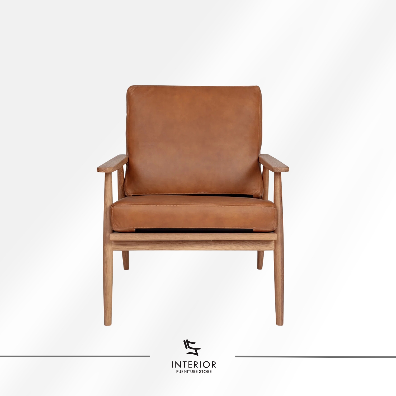 Solid wood armchair with angled frame and brown leather cushion, minimalist modern design
