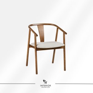 Wooden dining chair with curved armrests and upholstered seat cushion.