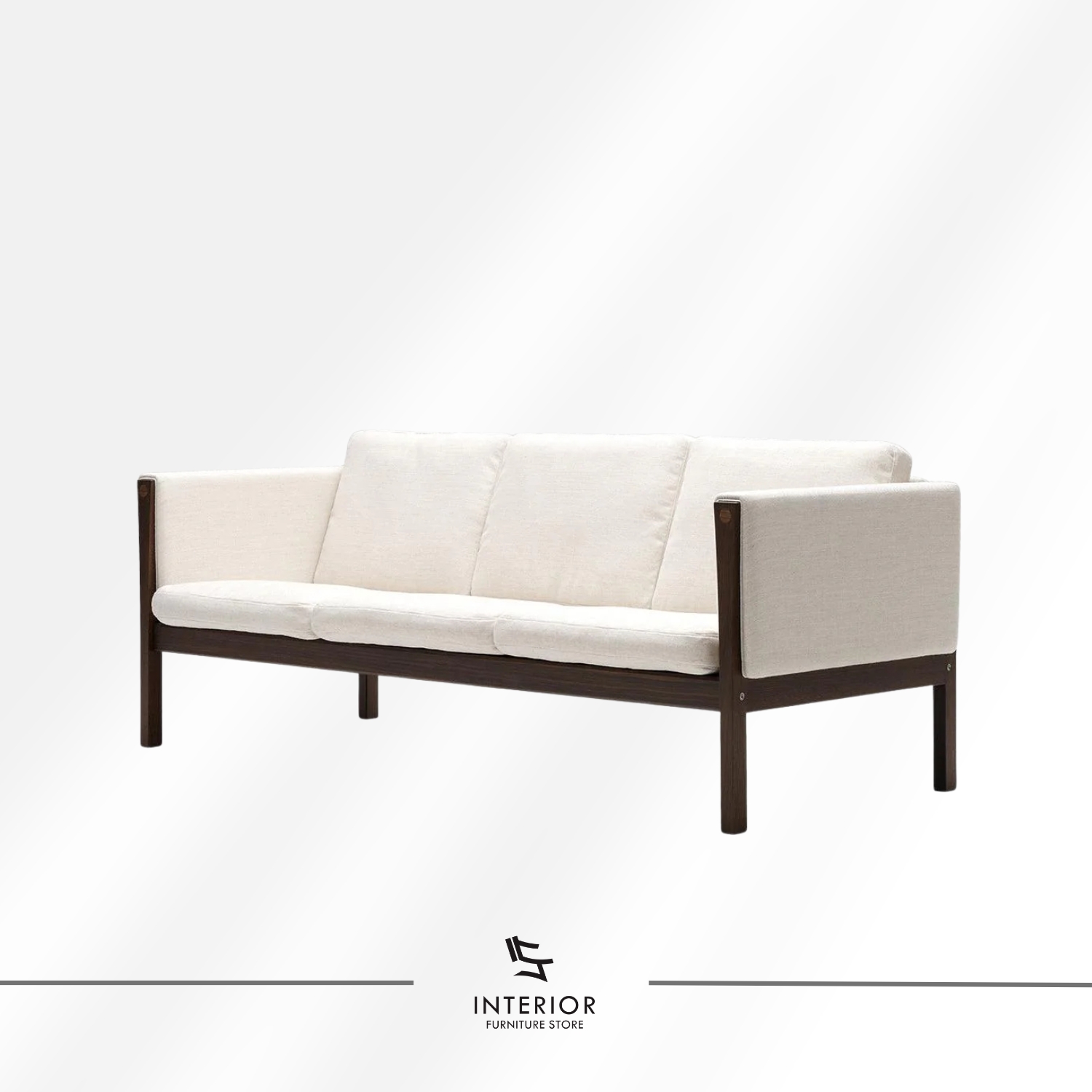 Modern wooden frame sofa with cream cushions, clean lines, and a minimalist silhouette.