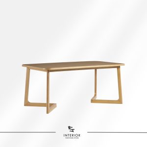 Rectangular wooden dining table with rounded corners and geometric wooden legs.
