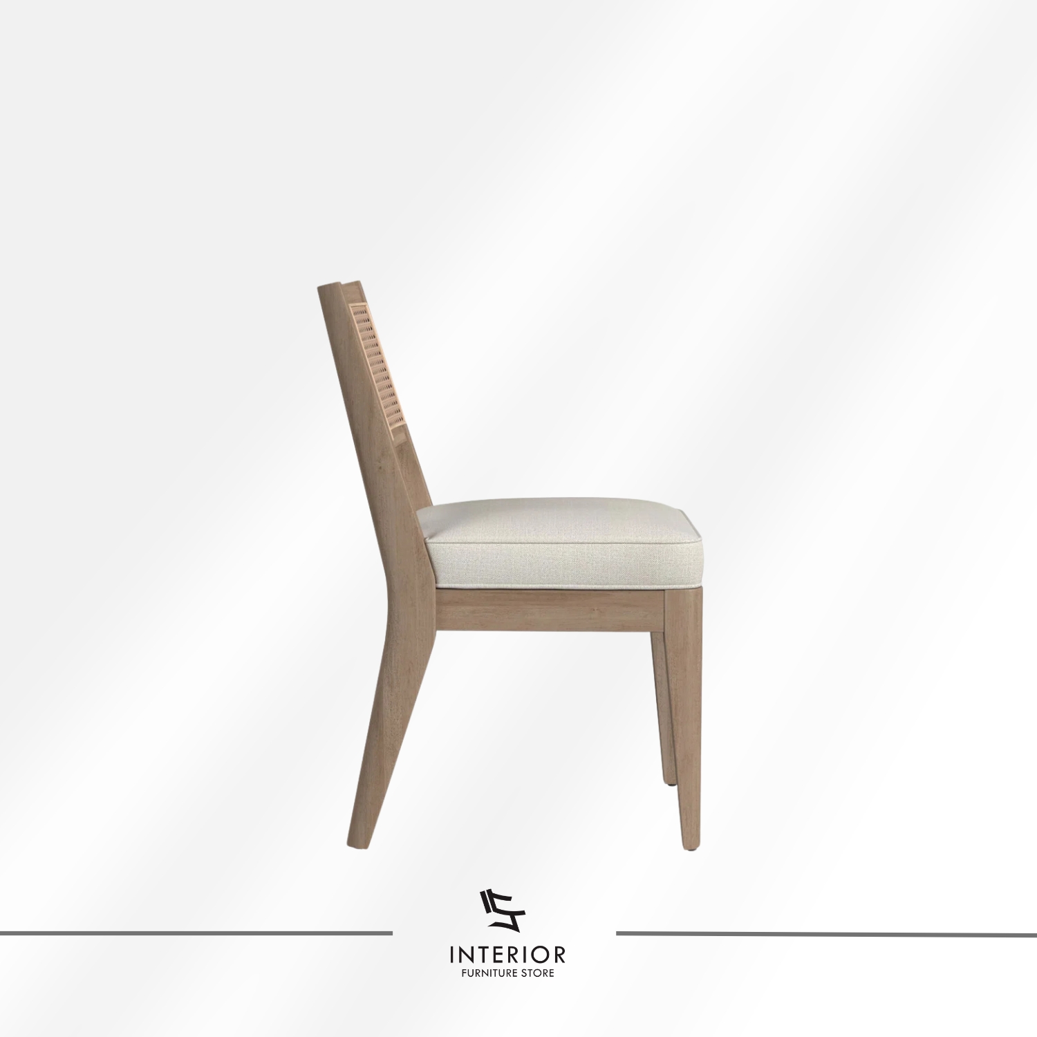 Wooden dining chair with a woven cane backrest and a cushioned upholstered seat.