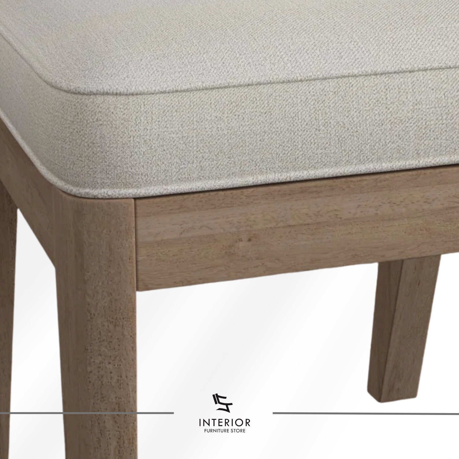 Wooden dining chair with a woven cane backrest and a cushioned upholstered seat.
