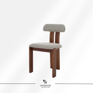 Wooden dining chair with upholstered seat and backrest, featuring a minimalist design with warm wood tones.