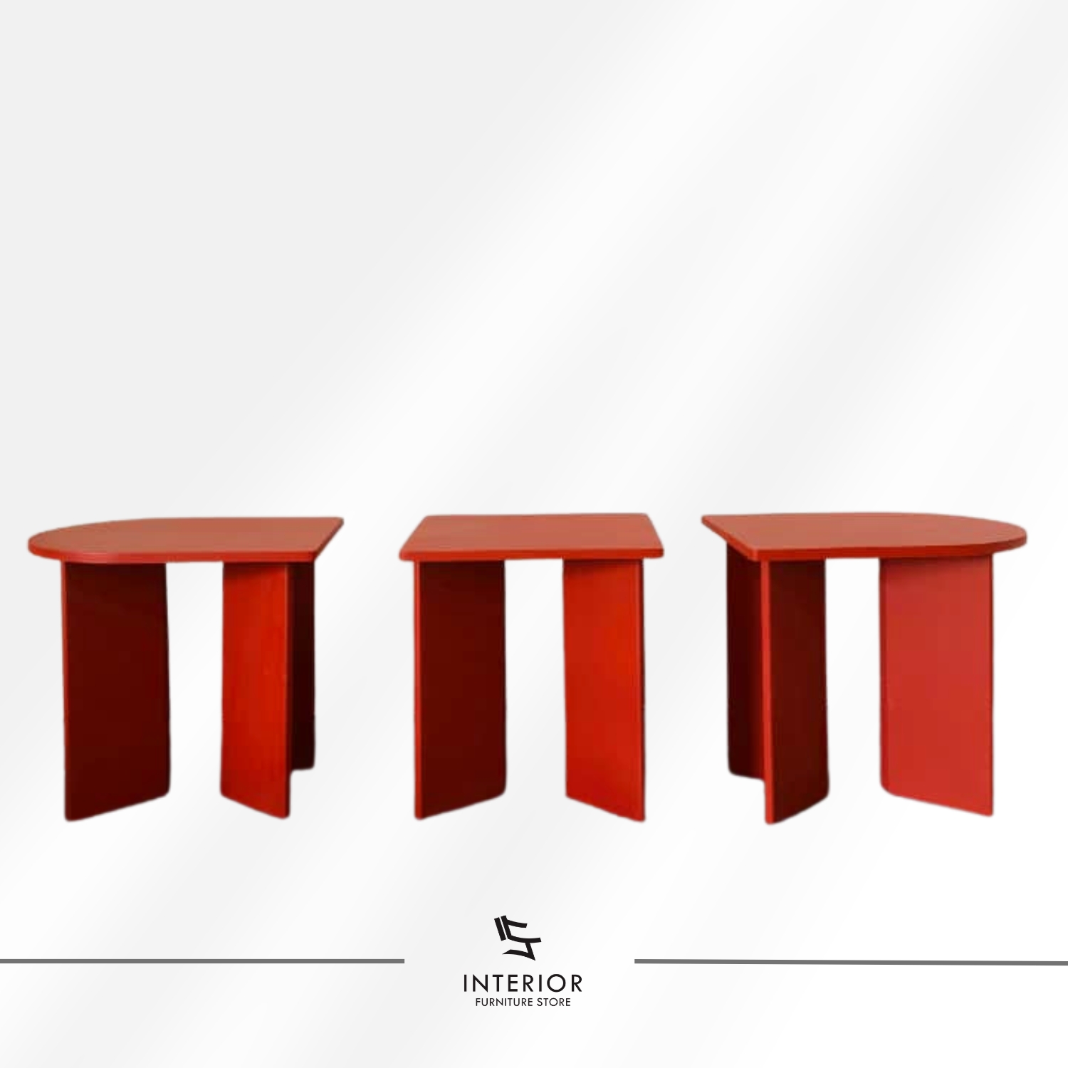 Modern dining table with bold geometric form and red finish, minimalist contemporary design