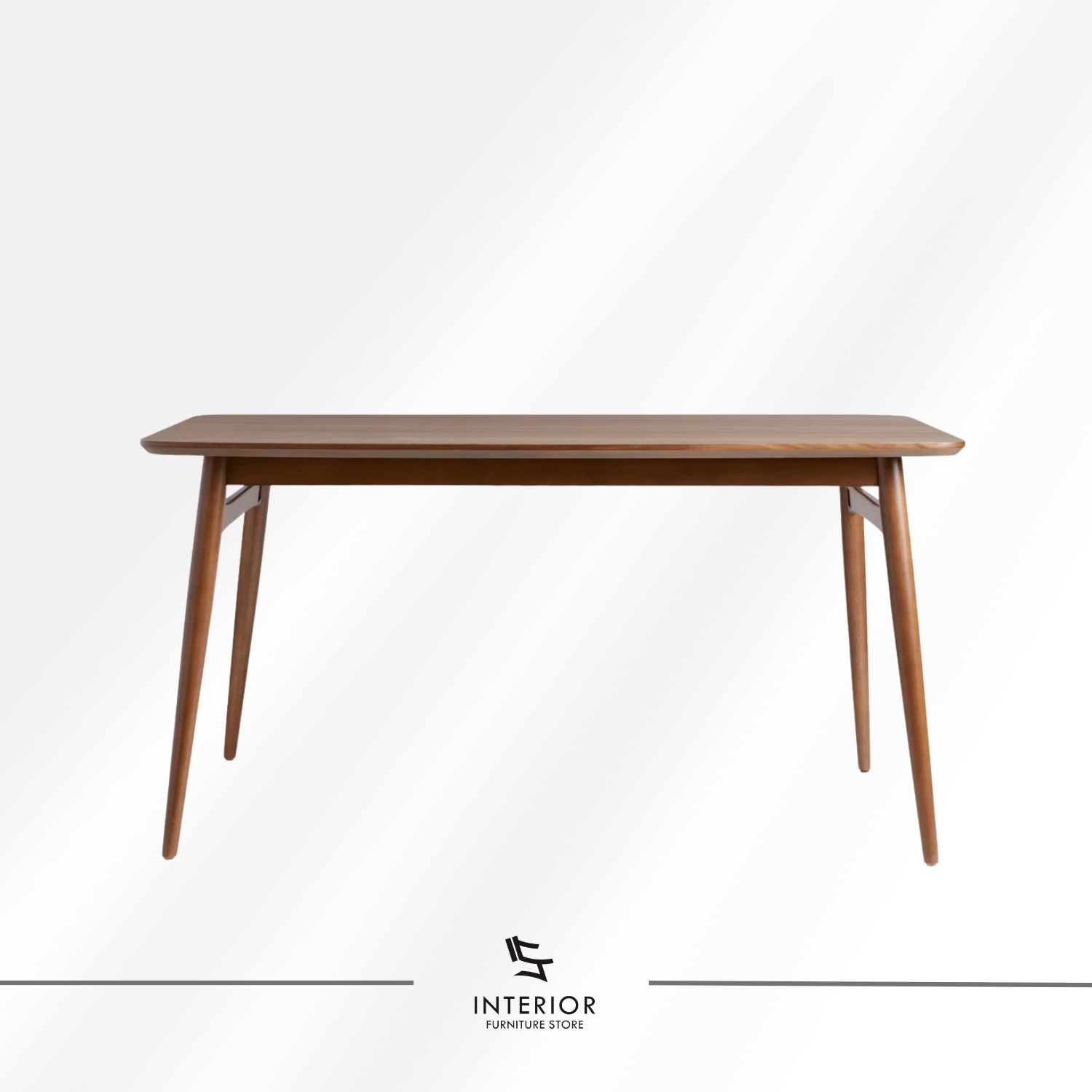 Solid wood dining table with rounded corners and tapered legs, minimalist modern design