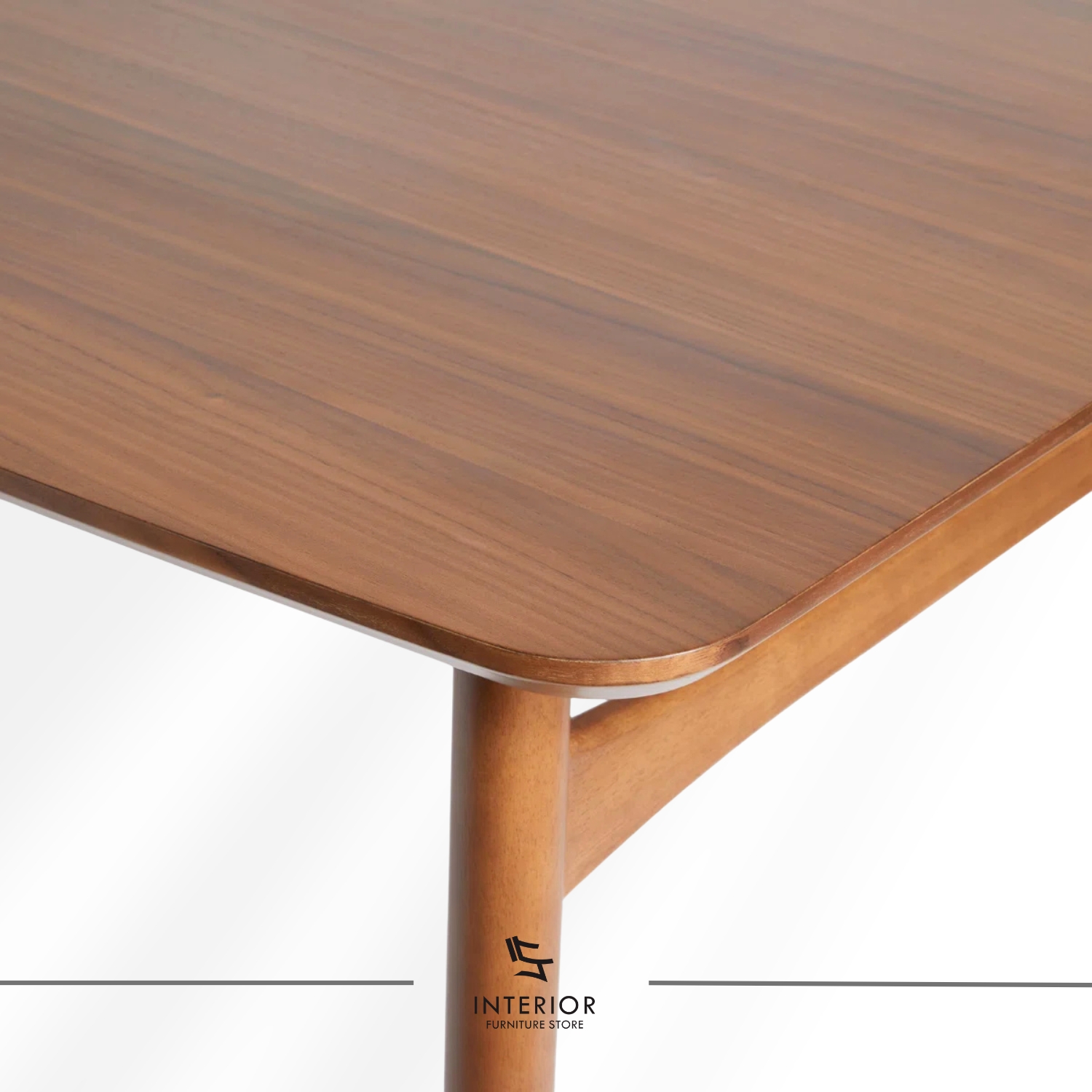 Solid wood dining table with rounded corners and tapered legs, minimalist modern design
