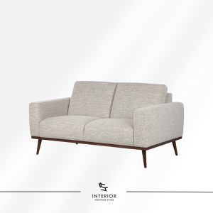 Modern two-seater sofa with light textured fabric upholstery, featuring wide armrests and tapered wooden legs.