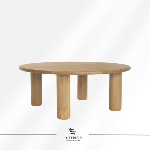 Round solid wood coffee table with thick cylindrical legs, minimalist sculptural design