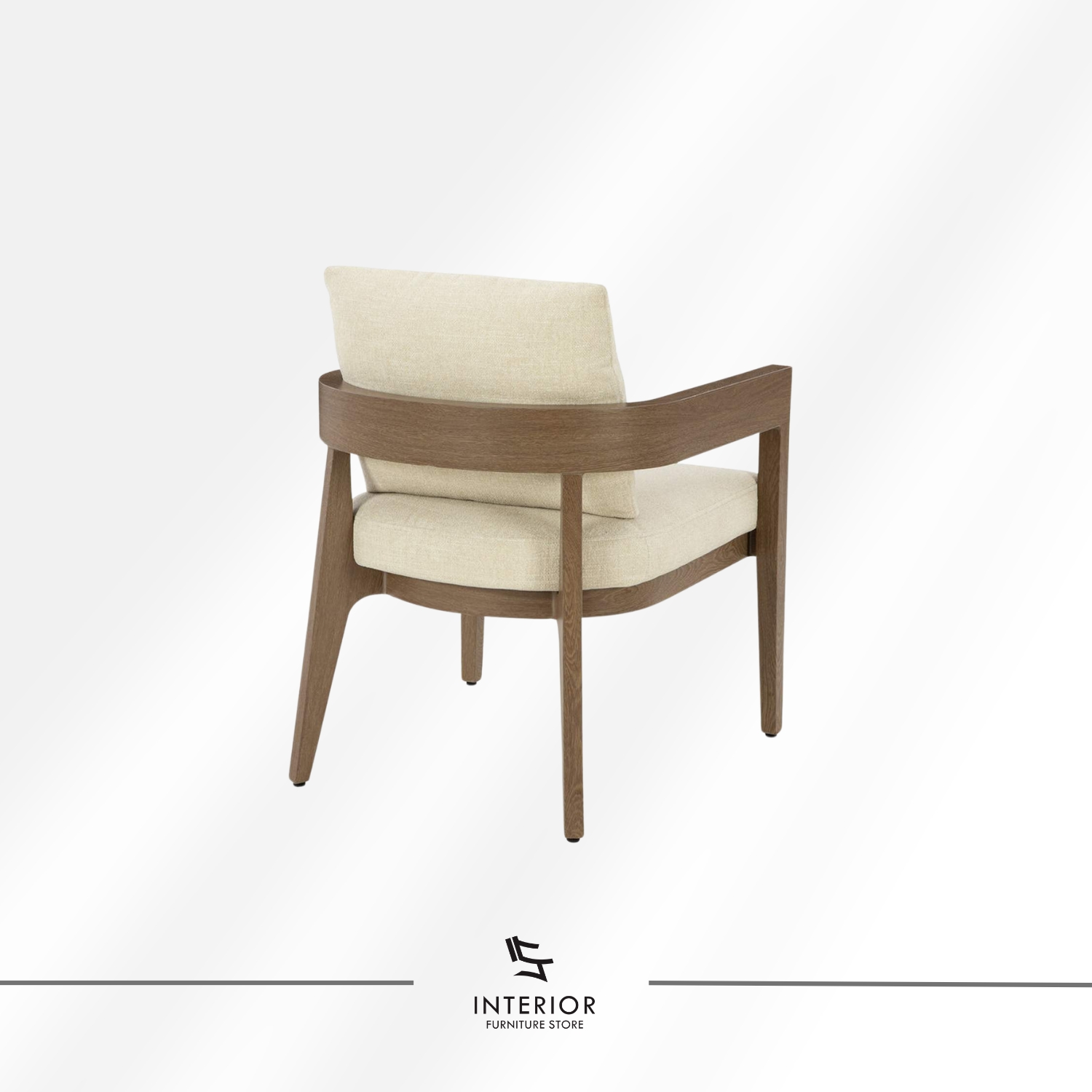 Solid wood armchair with wide armrests and soft cream upholstered seat, minimalist modern style