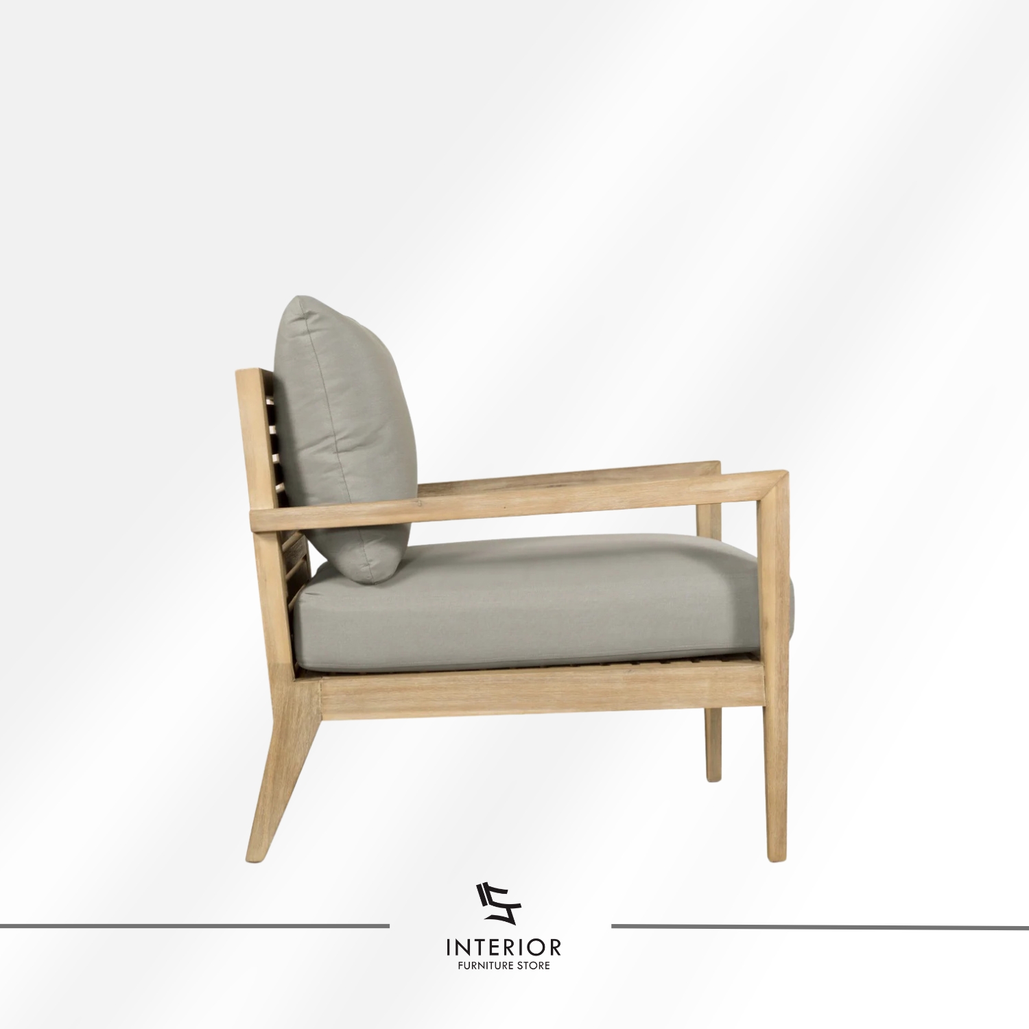 Solid wood armchair with light natural finish and soft grey upholstered seat, minimalist design