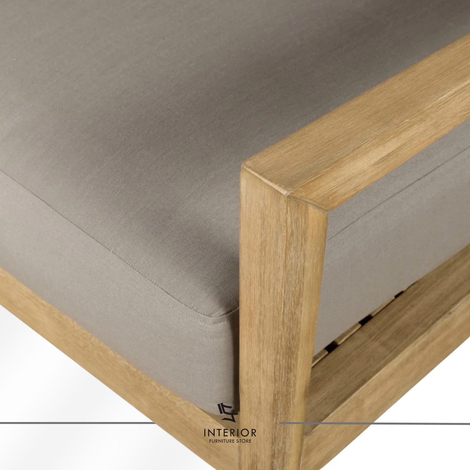 Solid wood armchair with light natural finish and soft grey upholstered seat, minimalist design